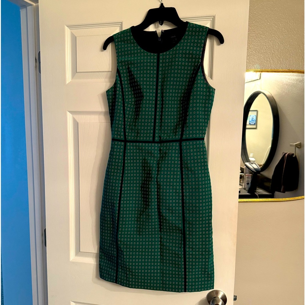 Cute sleeveless green dress with navy dots and lining